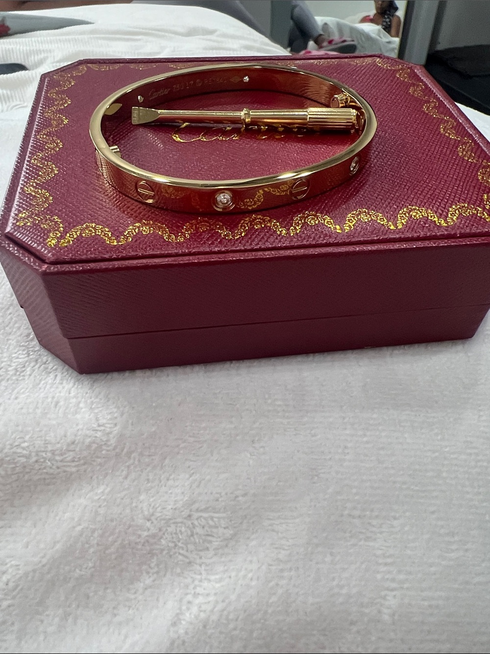 Cartier-Style Gold Screw Motif Bangle with Diamonds
